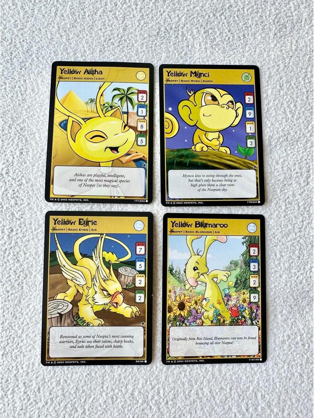 NEAR MINT+ 2003 Neopets TCG Yellow Bundle of 4 Trading Cards